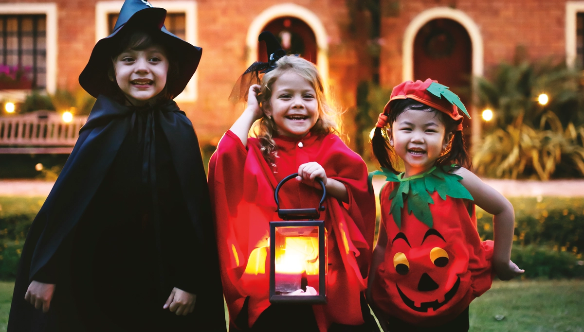 kids-in-costumes-trick-or-treating-1200x683.webp