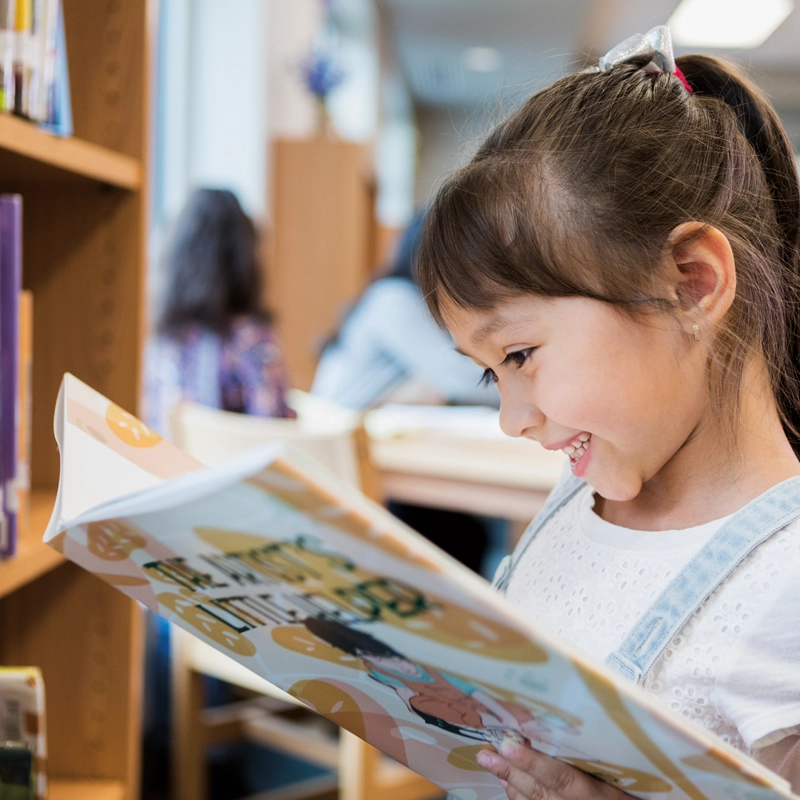 young-girl-reading-a-book-800x800.webp